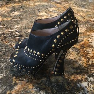 Miu Miu gold studded booties